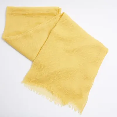 Yellow lightweight tassel scarf sold by River Island