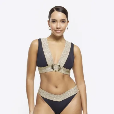 Black buckle bikini top sold by River Island