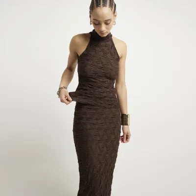 Brown textured halter neck top sold by River Island