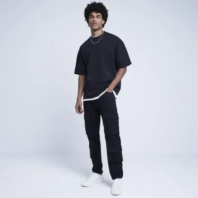 Black oversized fit graphic script t-shirt sold by River Island