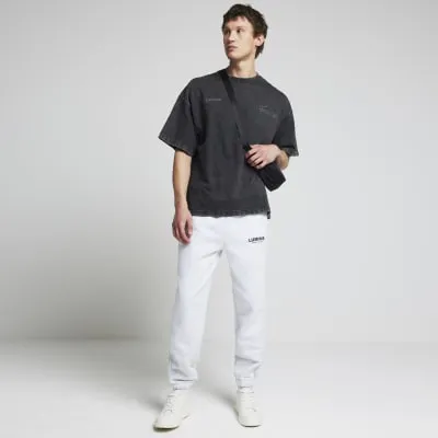 Black oversized fit graphic print t-shirt sold by River Island