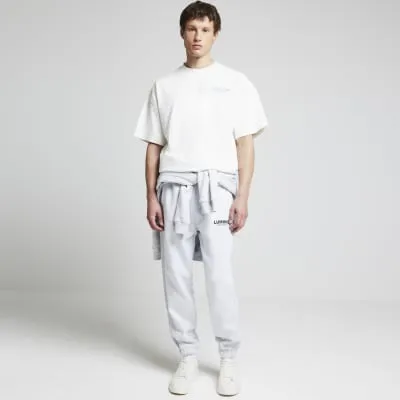 White oversized fit embossed print t-shirt sold by River Island
