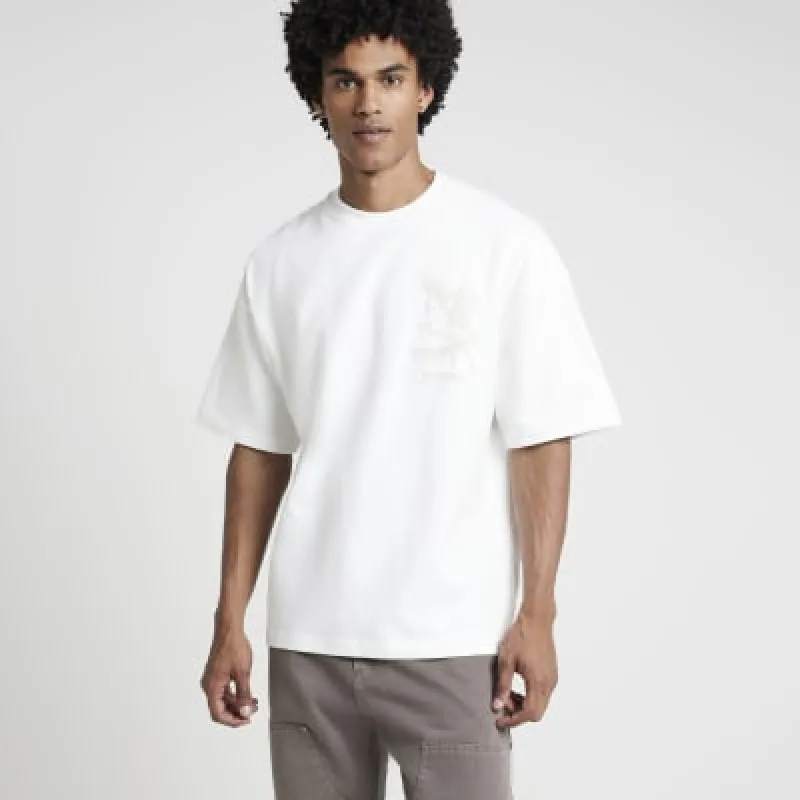 White oversized fit embossed graphic t-shirt sold by River Island
