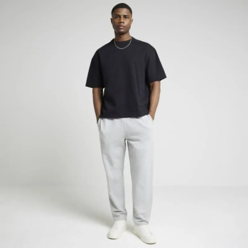 Grey slim fit open hem joggers sold by River Island