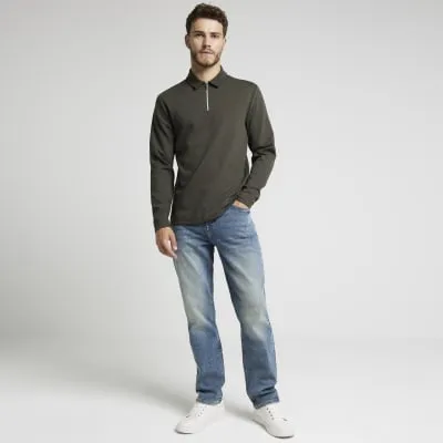 Khaki slim fit textured half zip polo sold by River Island