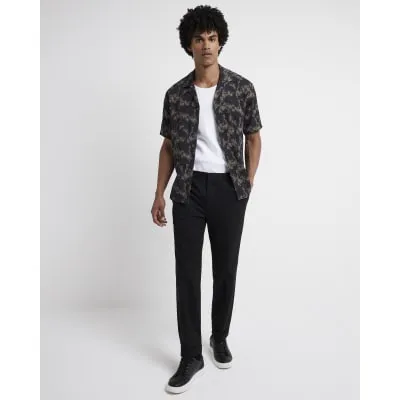 Black slim fit twill smart joggers sold by River Island