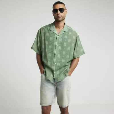 Green oversized fit abstract revere shirt sold by River Island