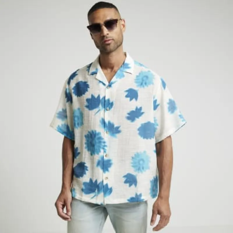 Blue oversized fit blur floral revere shirt sold by River Island