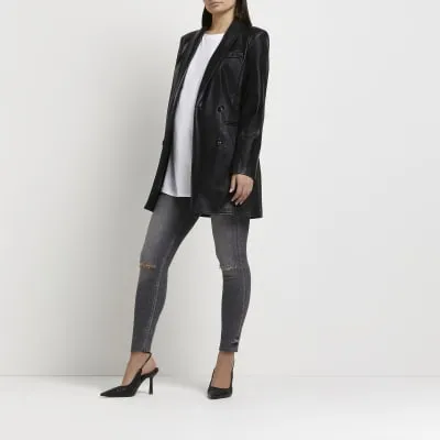 Grey ripped mid rise maternity skinny jeans sold by River Island