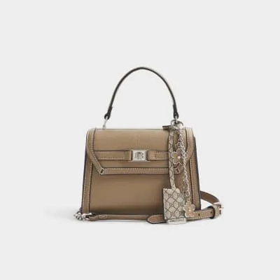 Beige cross body mini top handle bag sold by River Island