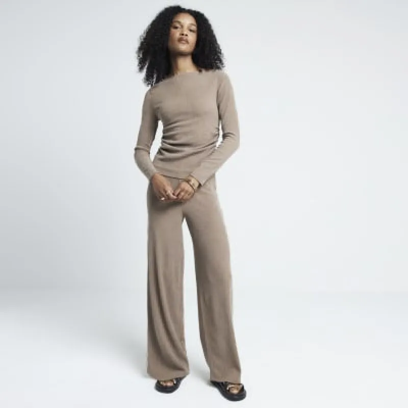 Brown textured wide leg trousers sold by River Island