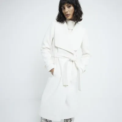 Cream belted wrap coat sold by River Island