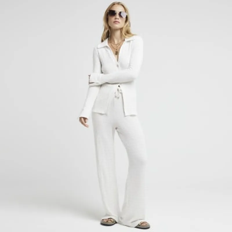 Cream Textured Wide Leg Trousers sold by River Island