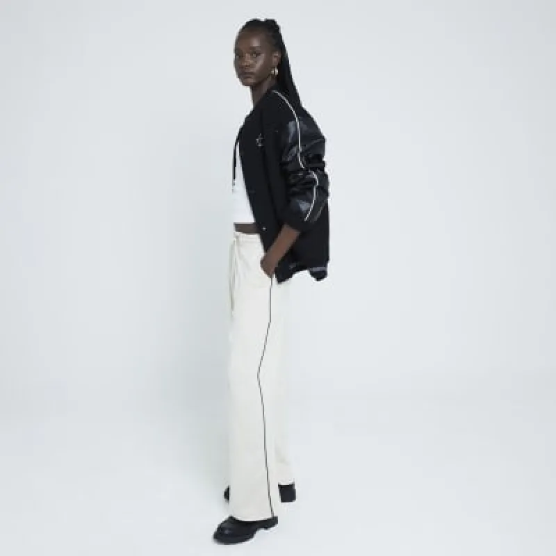 White tipped wide leg joggers sold by River Island