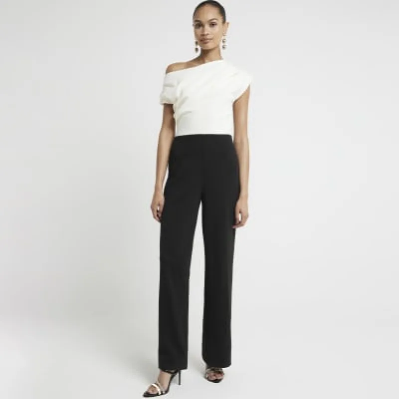 Black asymmetric drape jumpsuit sold by River Island