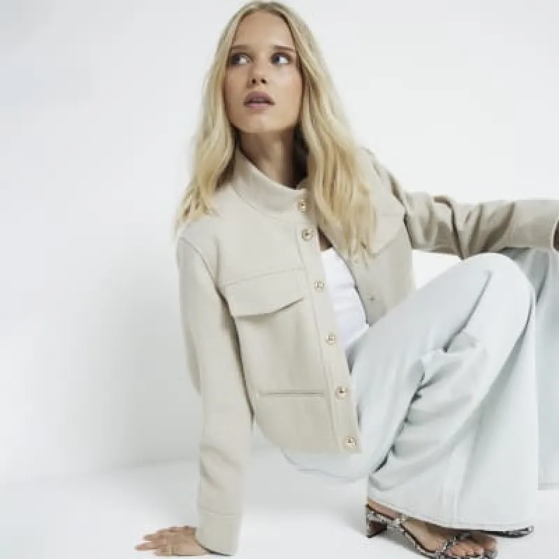 Beige funnel neck jacket sold by River Island