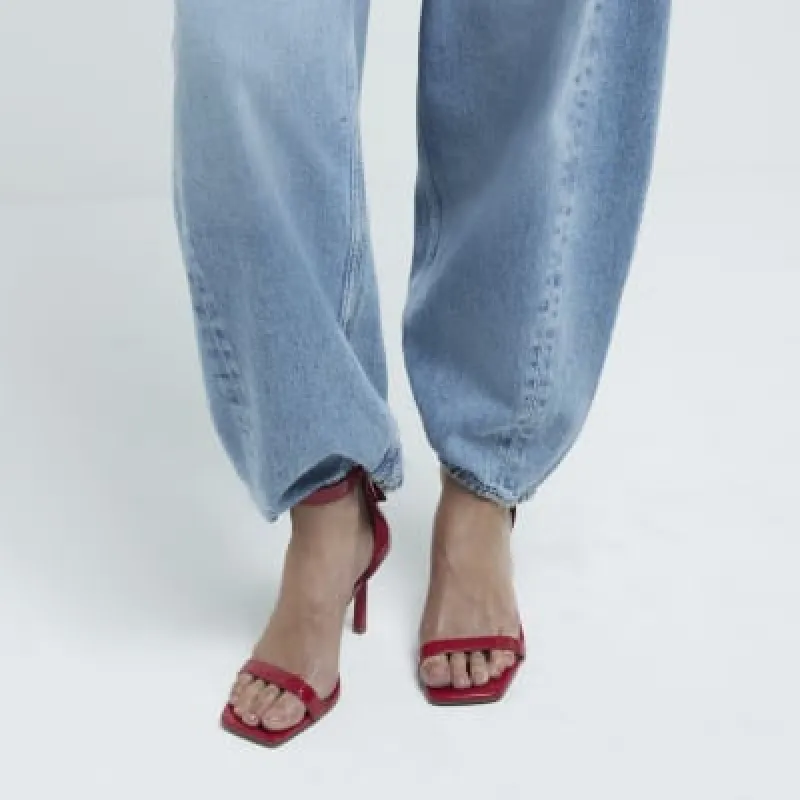 Red wide fit patent clasp heeled sandals sold by River Island