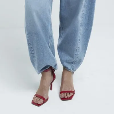 Red wide fit patent clasp heeled sandals sold by River Island