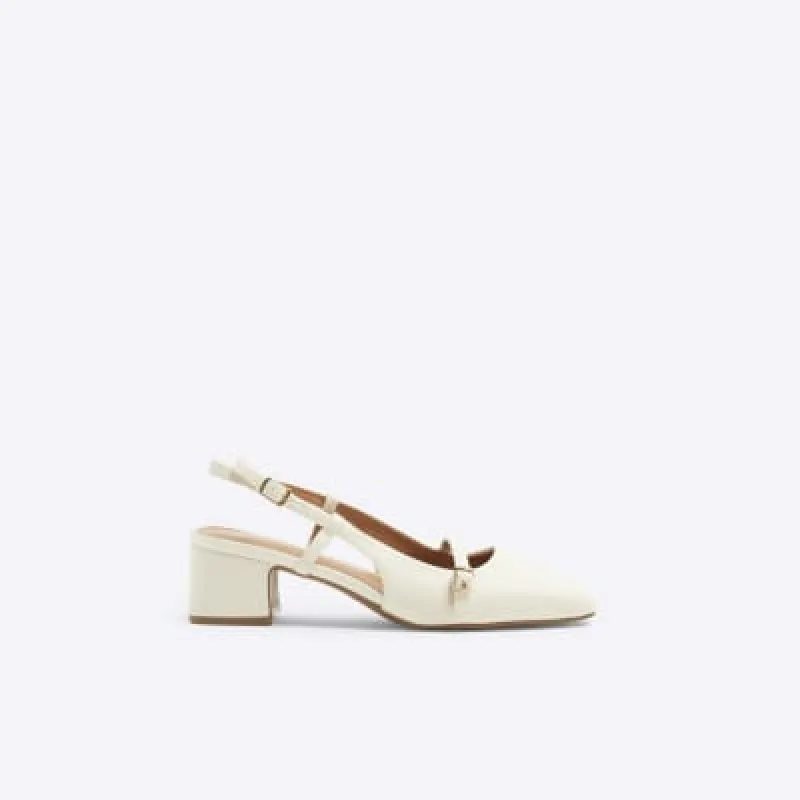 Beige buckle sling back heeled court shoes sold by River Island