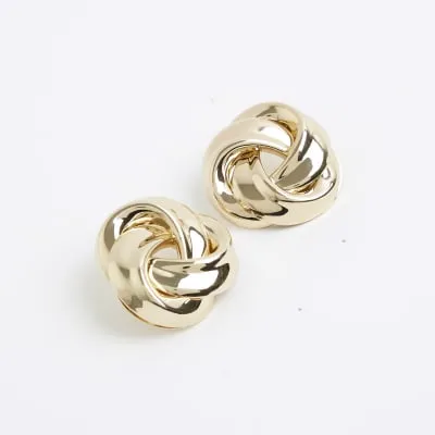 Gold swirl stud earrings sold by River Island