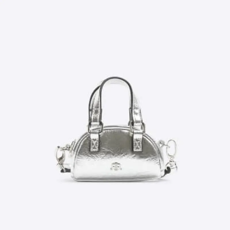 Silver mini bowler cross body bag sold by River Island