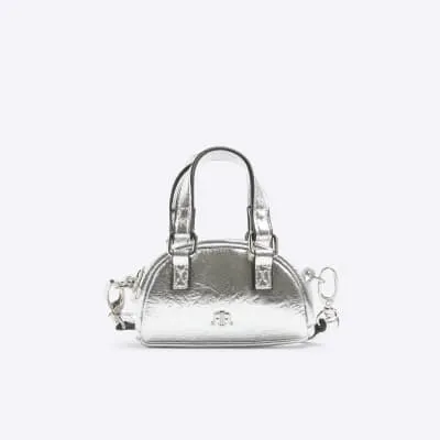 Silver mini bowler cross body bag sold by River Island