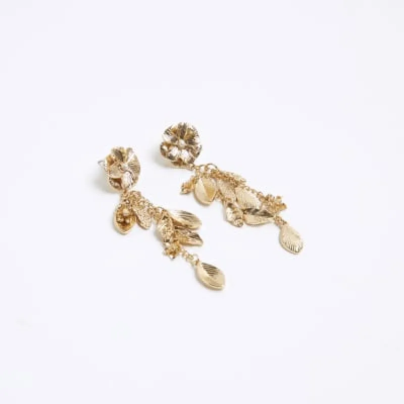 Gold flower drop earrings sold by River Island