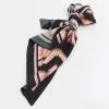 Black Geometric Floral Plisse Scarf sold by River Island