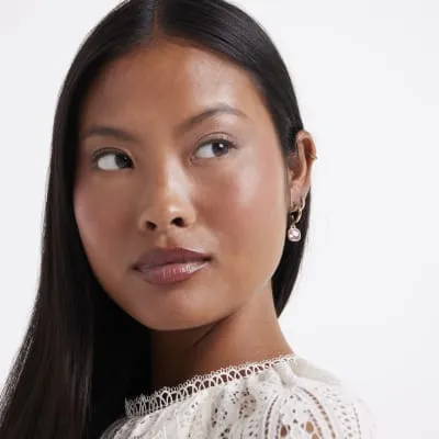 Gold stone hoop earrings multipack sold by River Island