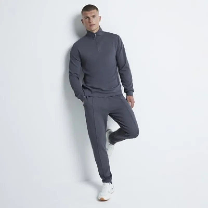 Grey slim fit stretch textured joggers sold by River Island