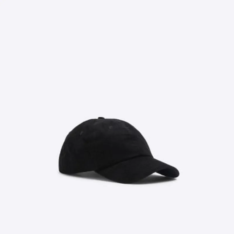Black corduroy embroidered cap sold by River Island