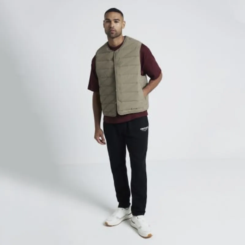 Stone regular fit quilted gilet sold by River Island