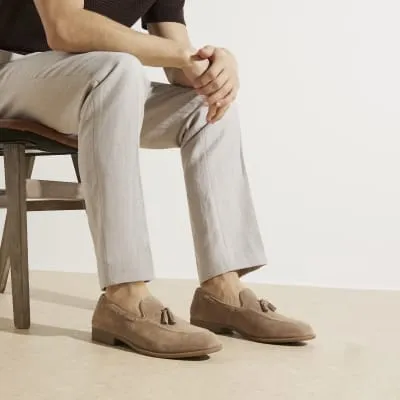 Stone suede tassel loafers sold by River Island