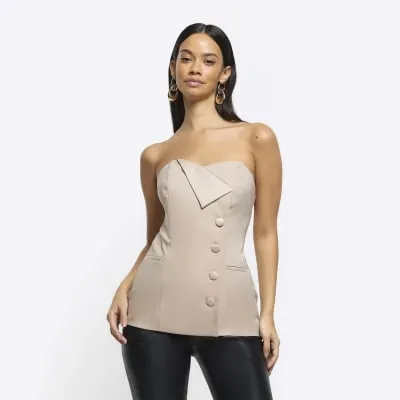 Cream bandeau tux top sold by River Island