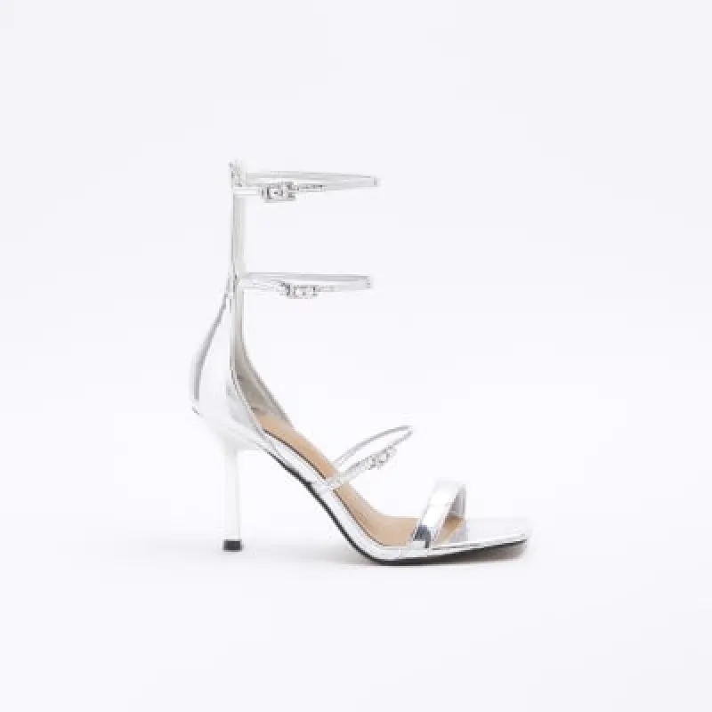 Silver strappy heeled sandals sold by River Island