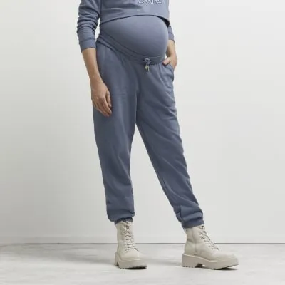 Blue maternity joggers sold by River Island