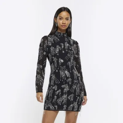 Black star embellishment bodycon mini dress sold by River Island