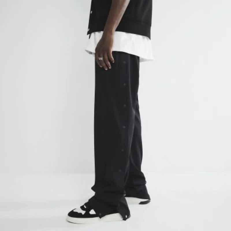 Black Open Hem Popper Jogger sold by River Island