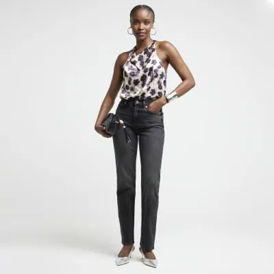 Cream satin floral halter neck top sold by River Island