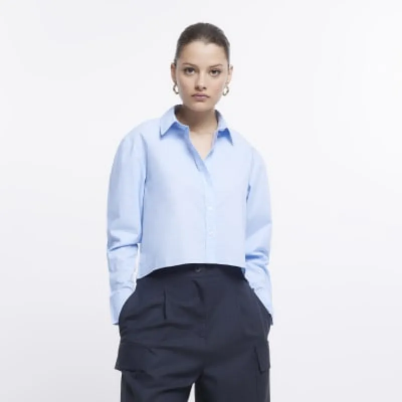 Blue long sleeve cropped shirt sold by River Island