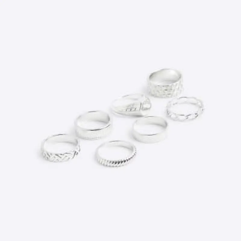 7 Pack  silver colour textured rings sold by River Island