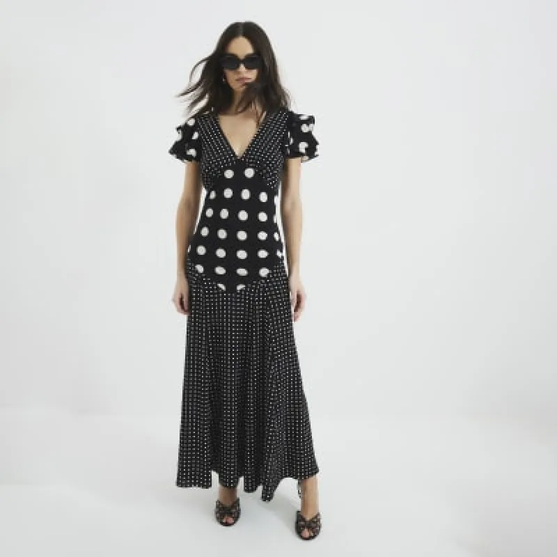 Black Sleeveless Spot Mix Ruffle Maxi Dress sold by River Island