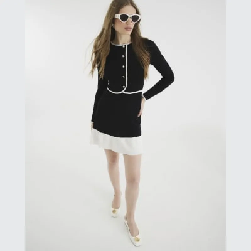 Black long sleeve knitted mini dress sold by River Island