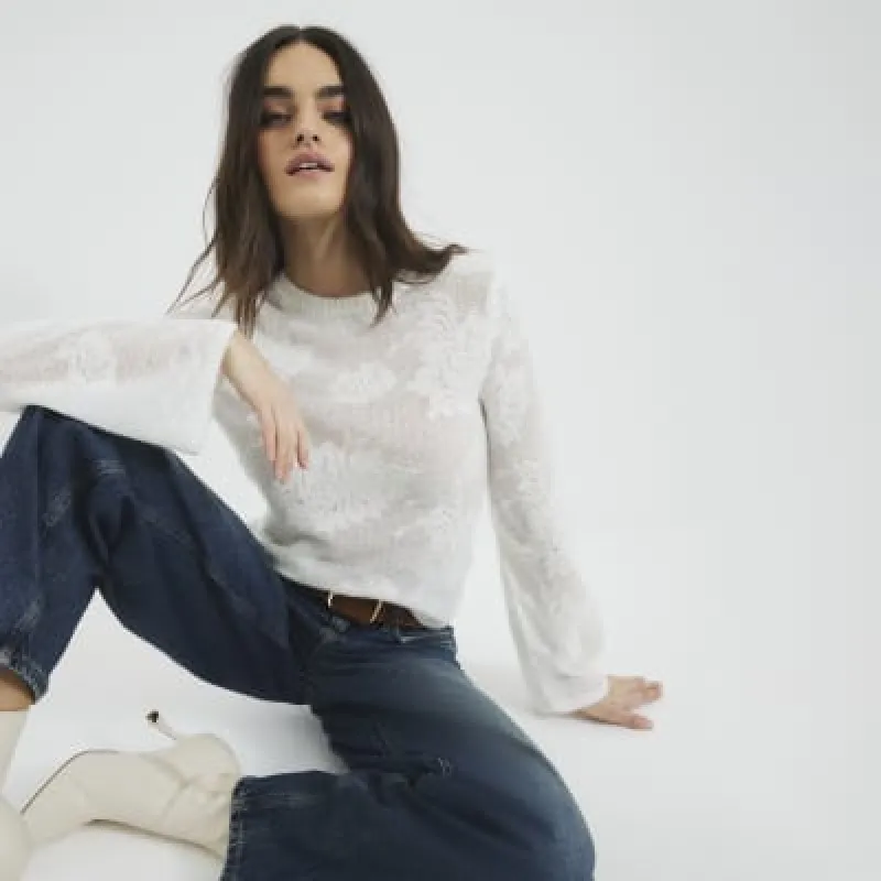 Cream Floral Long Sleeve Knit Top sold by River Island