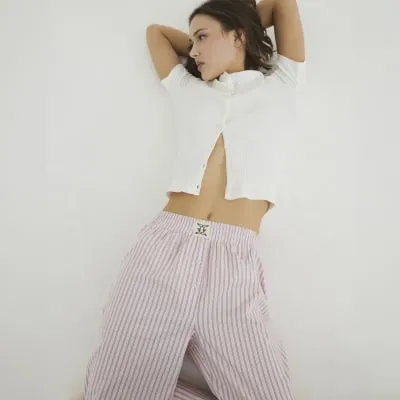 Pink Stripe Woven Trousers sold by River Island