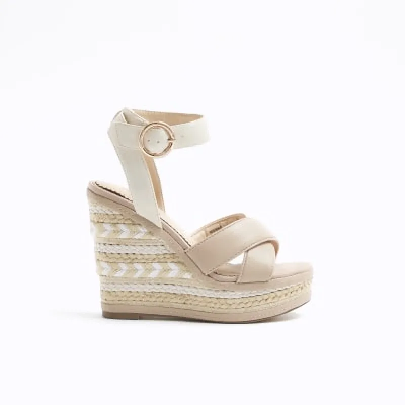 White crossed wedge espadrille sandals sold by River Island