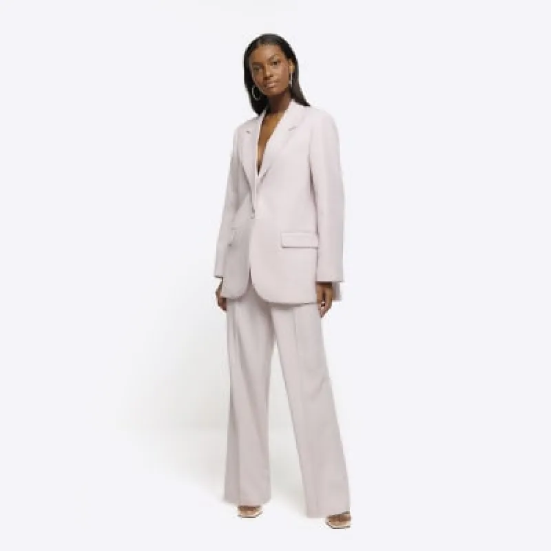 Pink diamante straight leg trousers sold by River Island