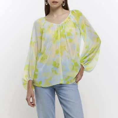 Green chiffon floral puff sleeve blouse sold by River Island