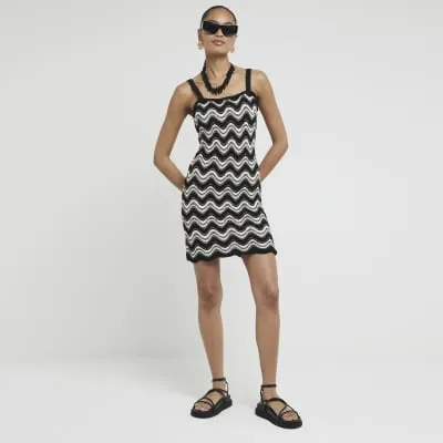 Black crochet knit chevron bodycon mini dress sold by River Island