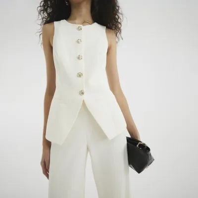 Cream Sleeveless Longline Waistcoat Jumpsuit sold by River Island